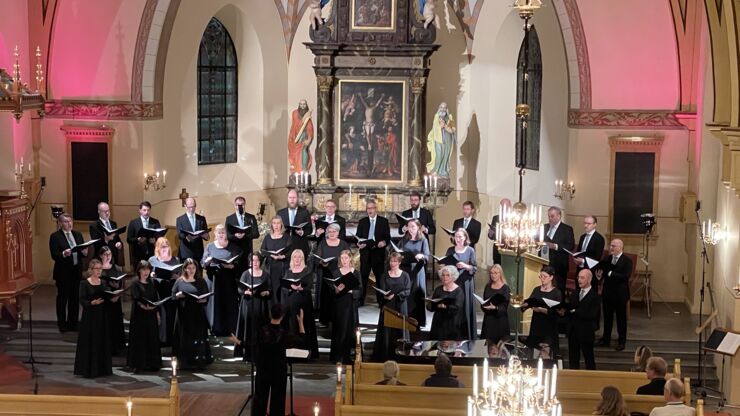 The choir sings in a church