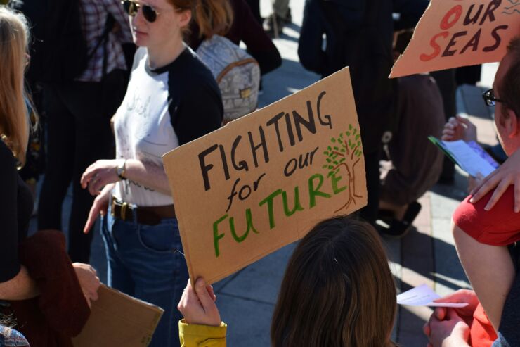 Sign about the climate in a protest