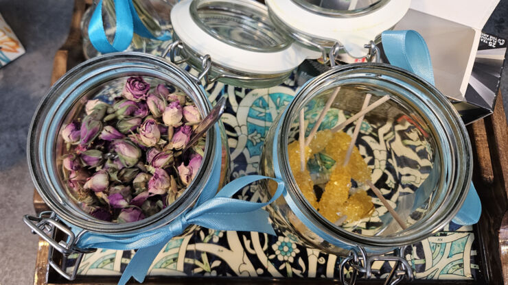 rose buds and sugar in glass containers