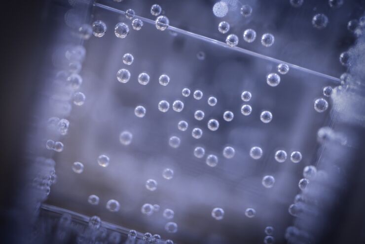 White bubbles on a lightblue background.