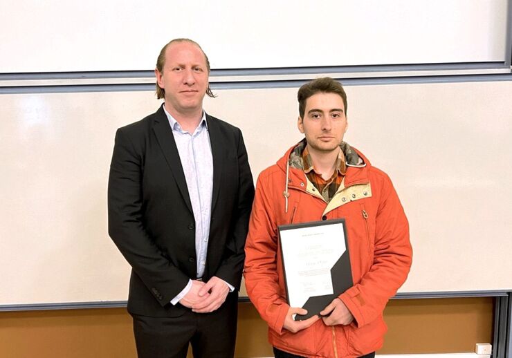 Adrian Lawson and PhD Student George Osipov at the award ceremony for the Lawson Scholarship.