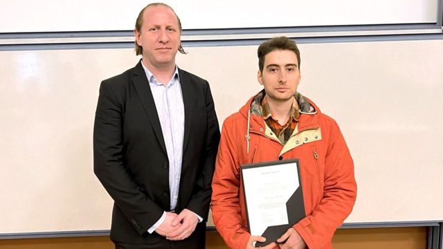 Adrian Lawson and PhD Student George Osipov at the award ceremony for the Lawson Scholarship.