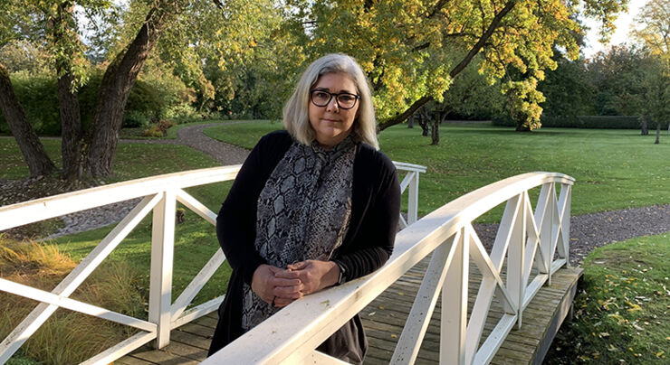 Ann Holmlid standing in a park