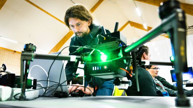 Piotr Rudol with one of the drones at Gränsö
