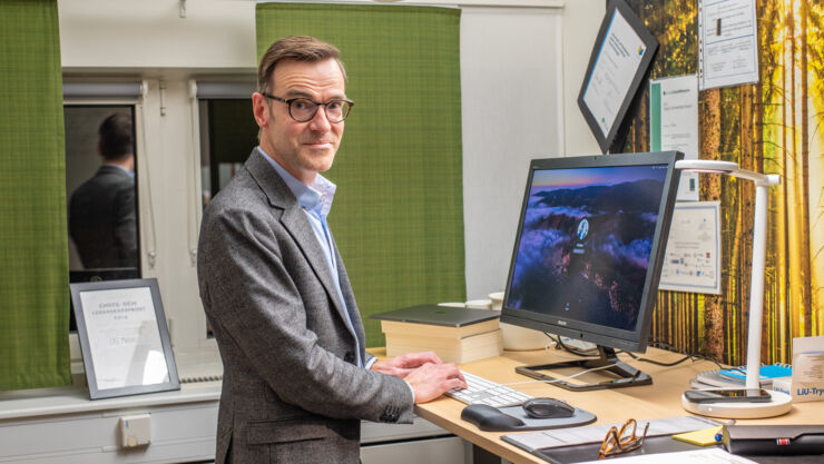 A man at his desk.