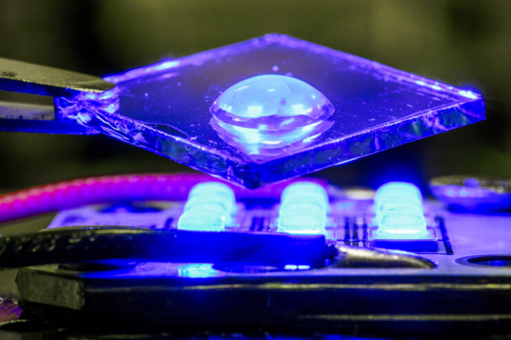 Sheet of glass with droplet.