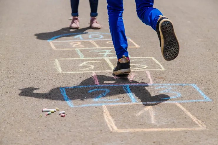 Children jumping, only legs visable