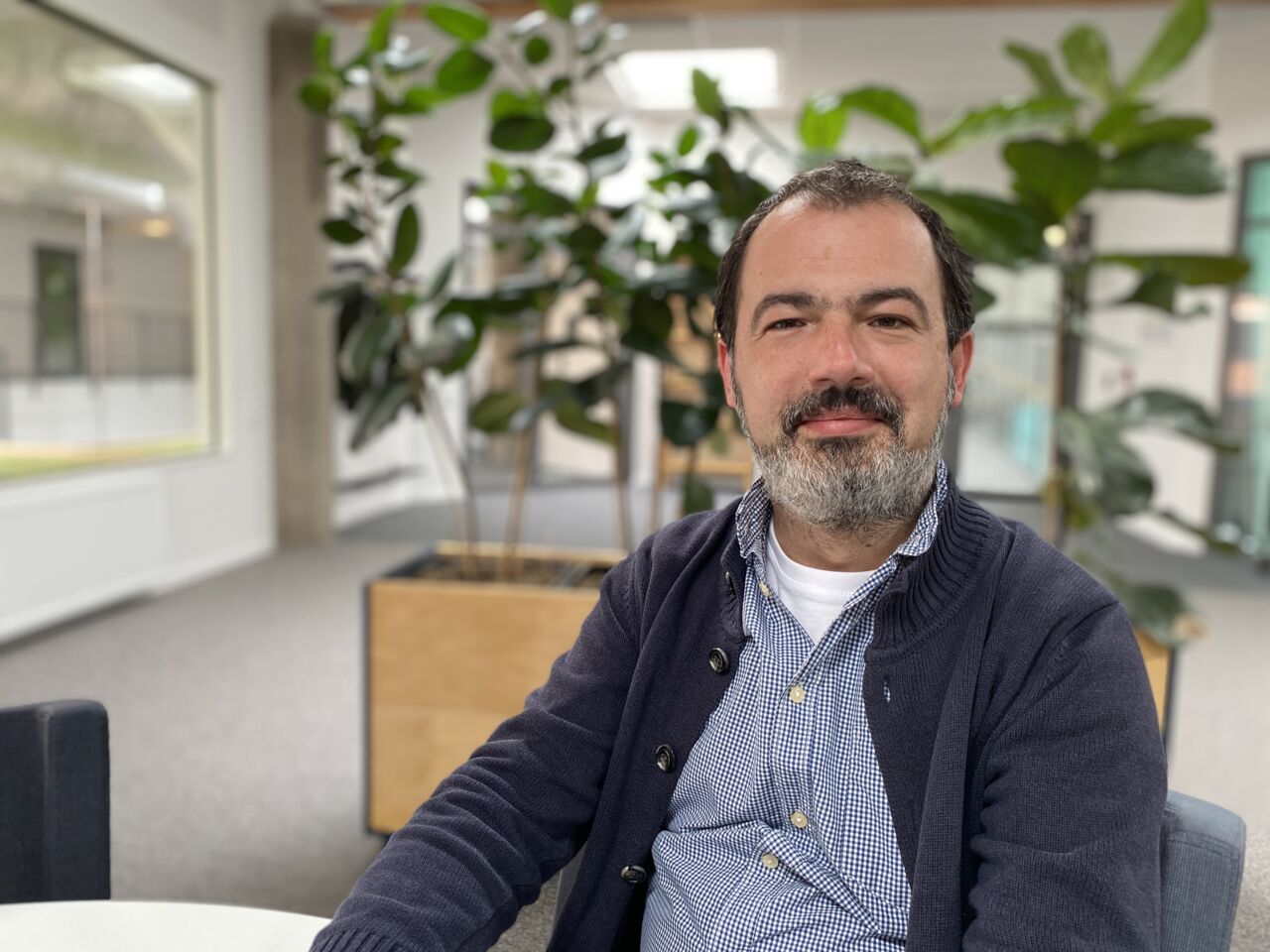 A man sitting at his desk