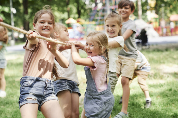 Children playing tug-of-war.