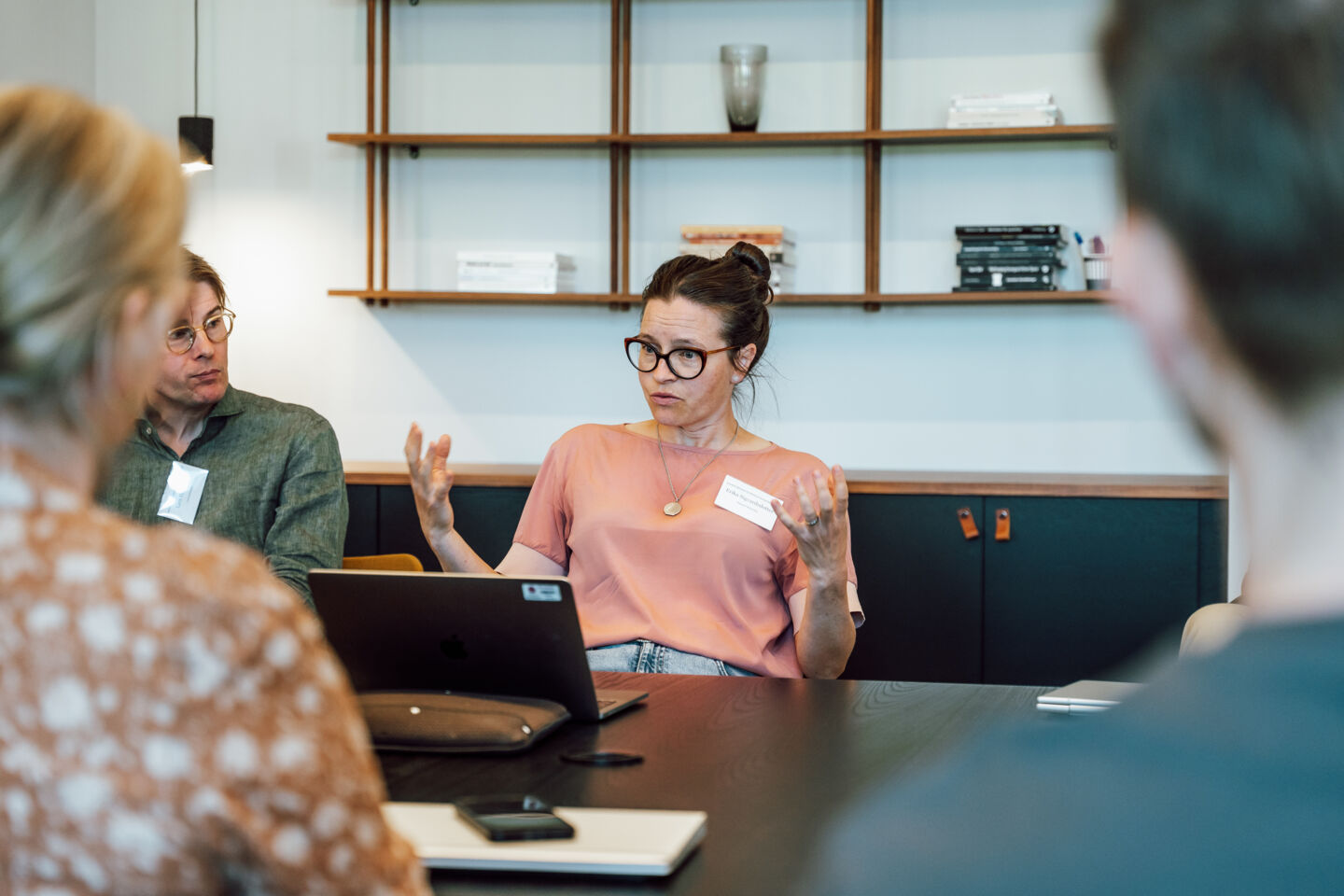 A person is talking during a meeting