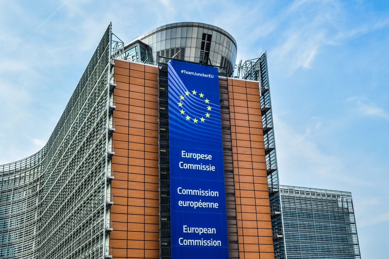 A big office building with the sign of the European Commission.