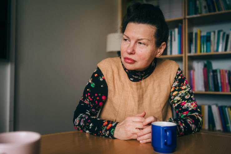 Woman at table.