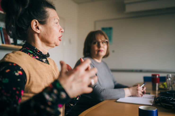 Two women at a table.