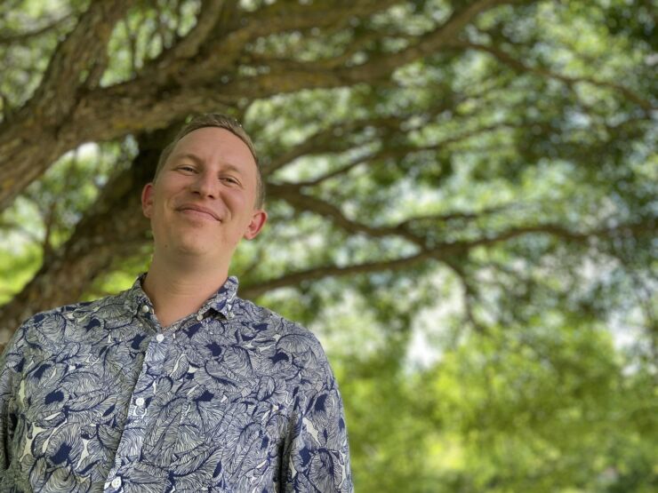 Portrait of man under a tree.