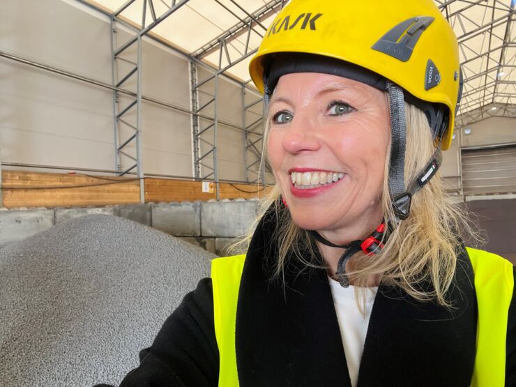 Woman in safety helmet.