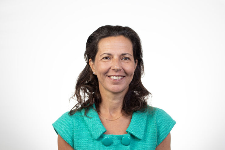 Headshot of a smiling woman.