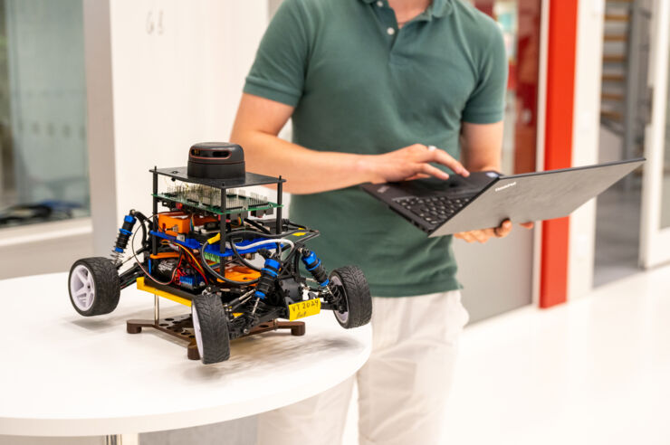 Autonomous robot gets instructions from laptop.