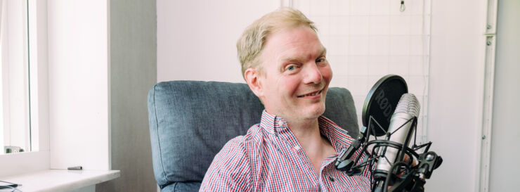 Man in front of microphone