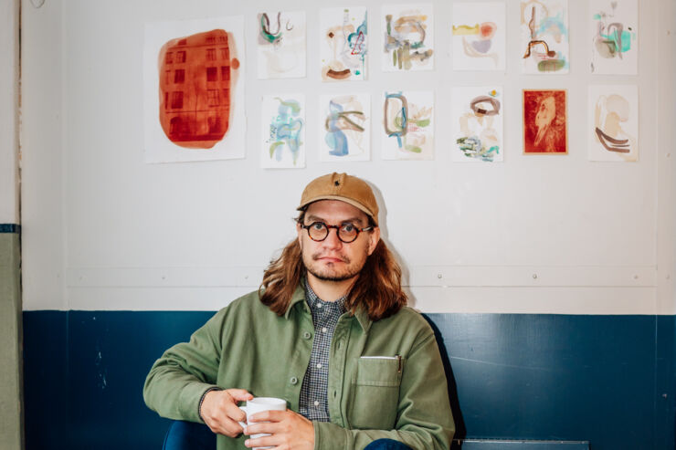 Researcher in front of art installation