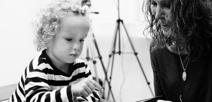 a young child is involved in a research project.