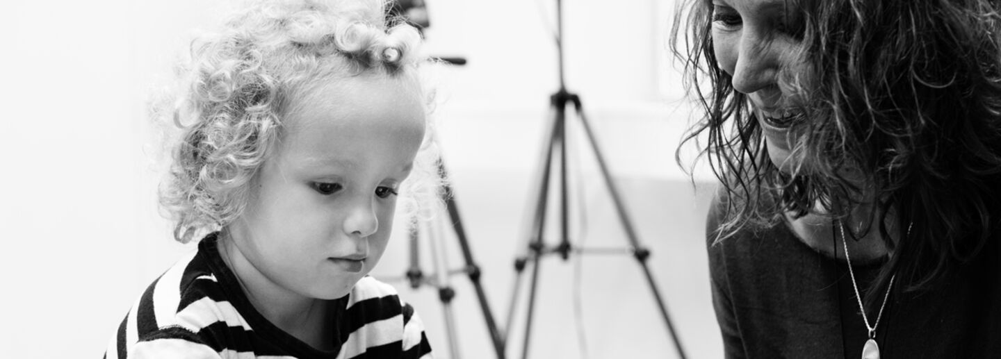 a young child is involved in a research project.