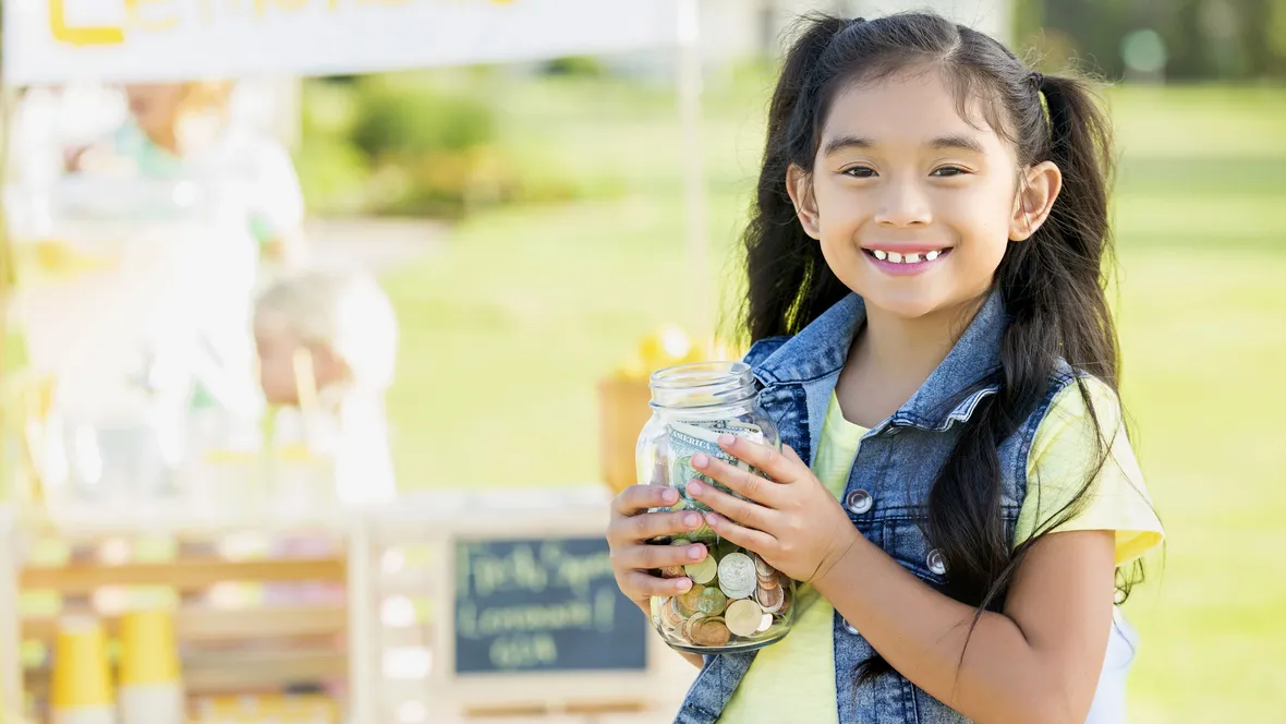 A girl with a money jar