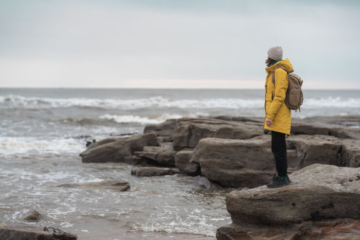 A woman looking out over the sea.