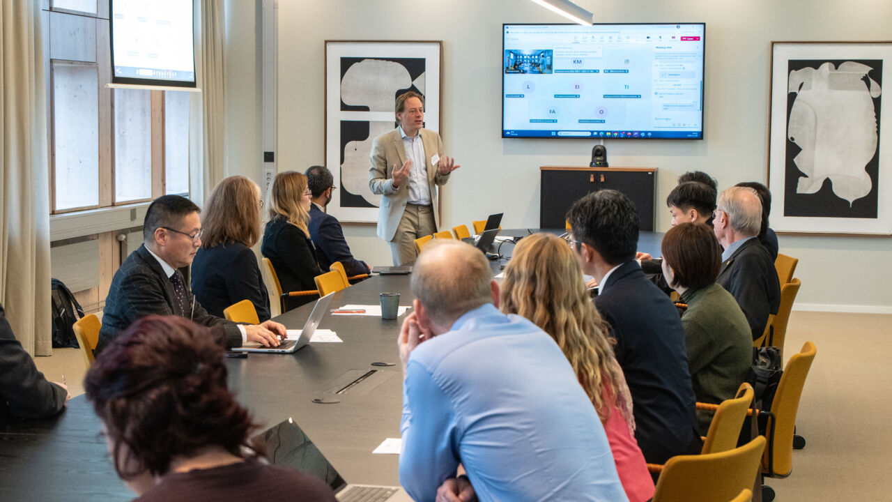 conference participants are listening to lecturer