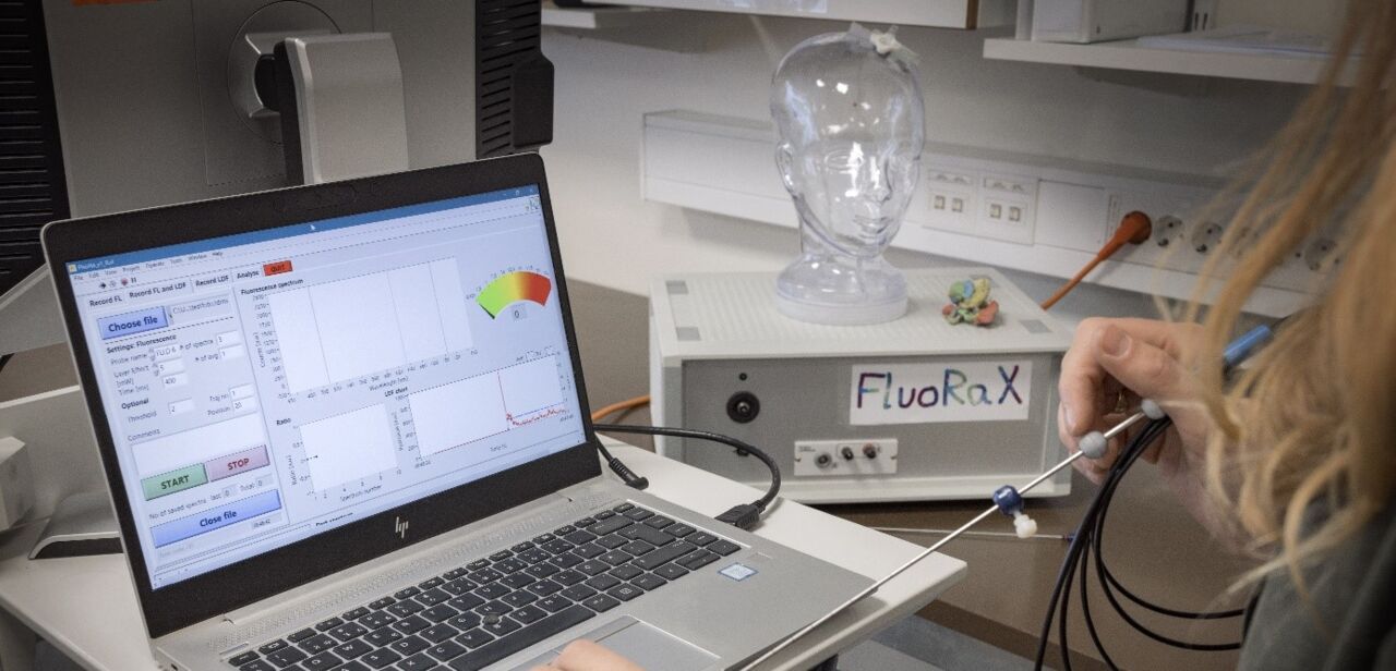 A woman sitting in front of a computor.