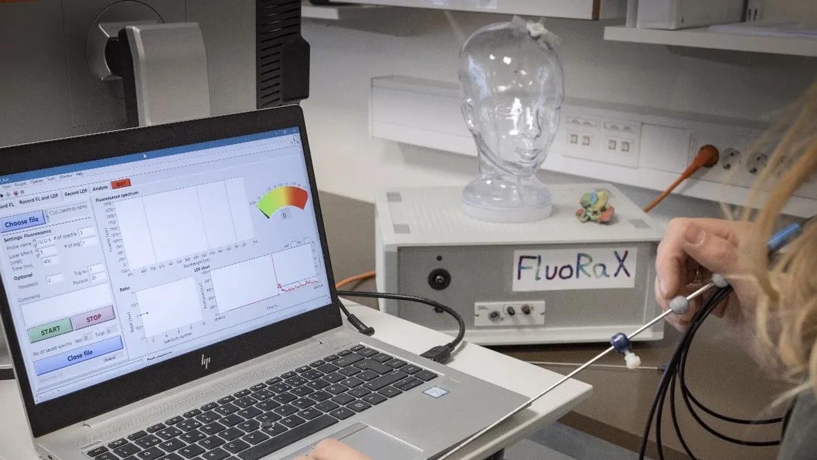 A woman sitting in front of a computor.